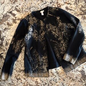 Black sweater with gold accents